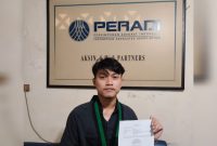 Formatur HMI Kebumen menunjukkan berkas kuasa hukum dari Aksin Lawfirm terkait rencana pelaporan ke polisi.